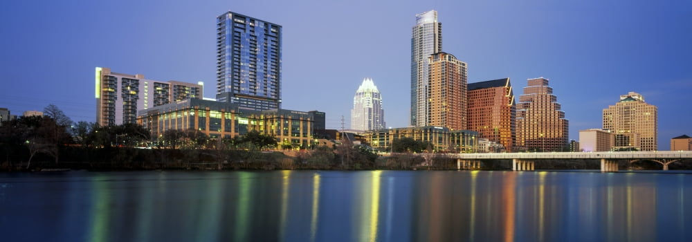 Skyscrapers at the waterfront Lady Bird Lake Austin Texas USA Canvas Art - Panoramic Images (36 x 12)