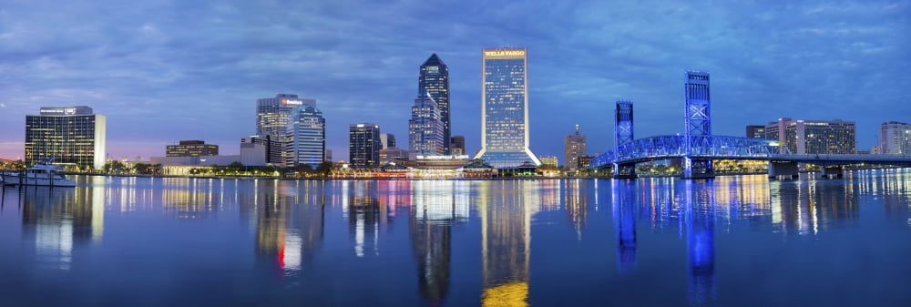 Skyscrapers at the waterfront Main Street Bridge St Johns River Jacksonville Florida USA Canvas Art - Panoramic Images (27 x 9)