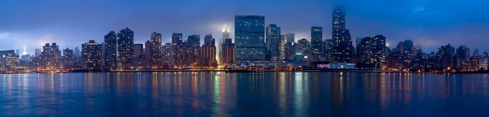 Skyscrapers at the waterfront Midtown Manhattan Manhattan New York City New York State USA Canvas Art - Panoramic Images (36 x 12)