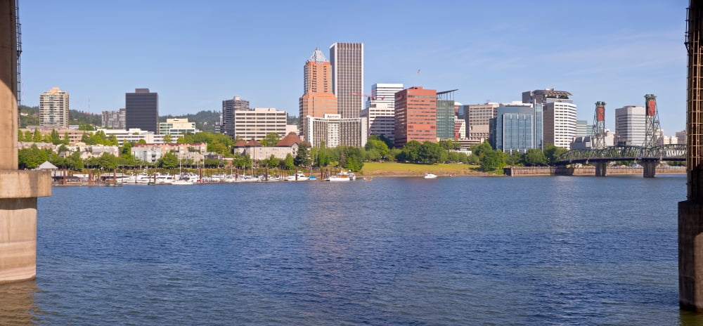 Skyscrapers at the waterfront Portland Multnomah County Oregon USA Canvas Art - Panoramic Images (12 x 24)