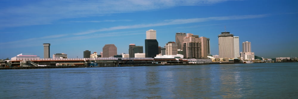 Skyscrapers at the waterfront River Mississippi New Orleans Louisiana USA Canvas Art - Panoramic Images (27 x 9)