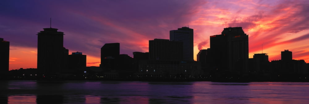 Skyscrapers at the waterfront River Mississippi New Orleans Louisiana USA Canvas Art - Panoramic Images (27 x 9)