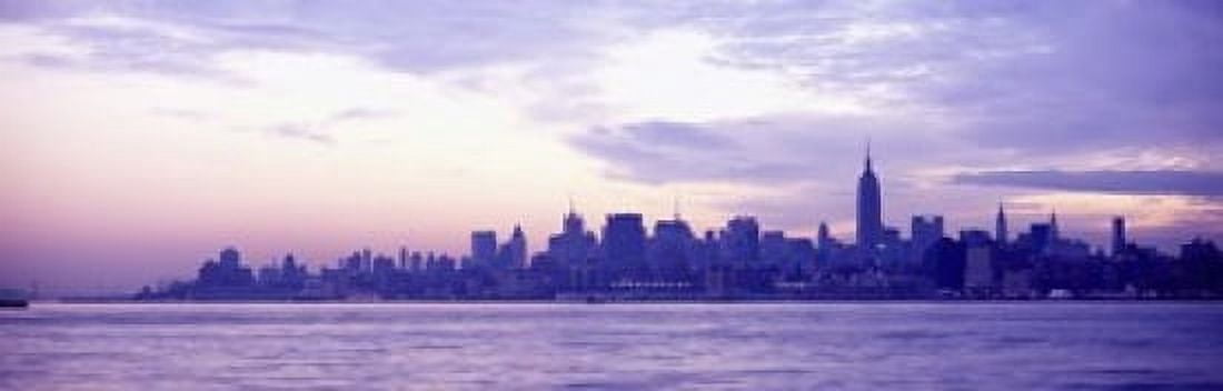 Skyscrapers at the waterfront at sunrise Manhattan New York City New York State USA Canvas Art - Panoramic Images (18 x 6)