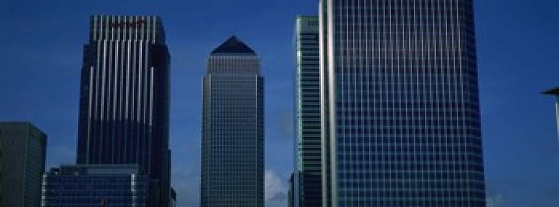 Skyscrapers in a city Canary Wharf London England Canvas Art - Panoramic Images (18 x 7)