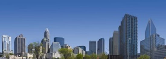 Skyscrapers in a city Charlotte Mecklenburg County North Carolina USA 2011 Canvas Art - Panoramic Images (36 x 13)