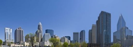 Skyscrapers in a city Charlotte Mecklenburg County North Carolina USA 2011 Canvas Art - Panoramic Images (36 x 13)
