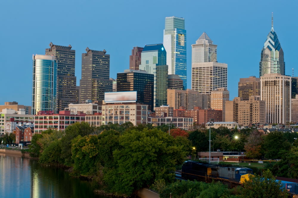 Skyscrapers in a city Delaware River Philadelphia Pennsylvania USA Canvas Art - Panoramic Images (12 x 36)
