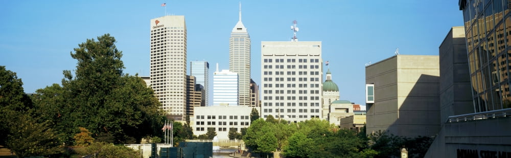 Skyscrapers in a city Indianapolis Canal Walk Indianapolis Indiana USA Canvas Art - Panoramic Images (12 x 39)