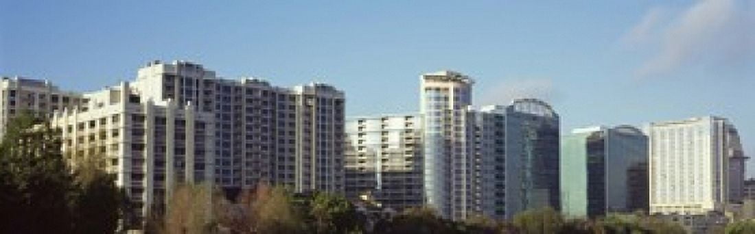 Skyscrapers in a city Lake Eola Orlando Orange County Florida USA Canvas Art - Panoramic Images (18 x 6)