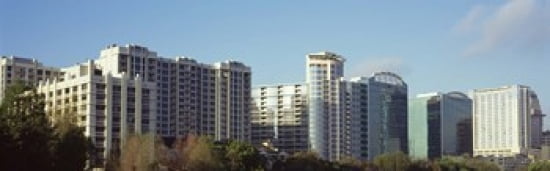 Skyscrapers in a city Lake Eola Orlando Orange County Florida USA Canvas Art - Panoramic Images (36 x 12)