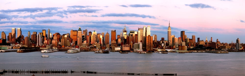 Skyscrapers in a city Manhattan New York City New York State USA Canvas Art - Panoramic Images (36 x 12)