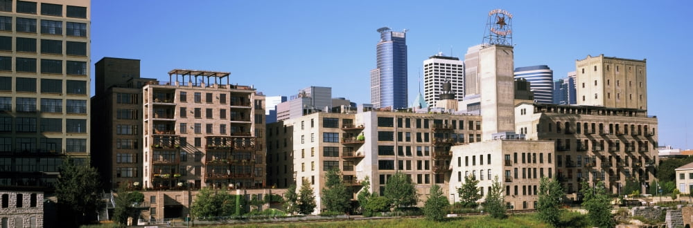Skyscrapers in a city Minneapolis Minnesota USA Canvas Art - Panoramic Images (12 x 36)