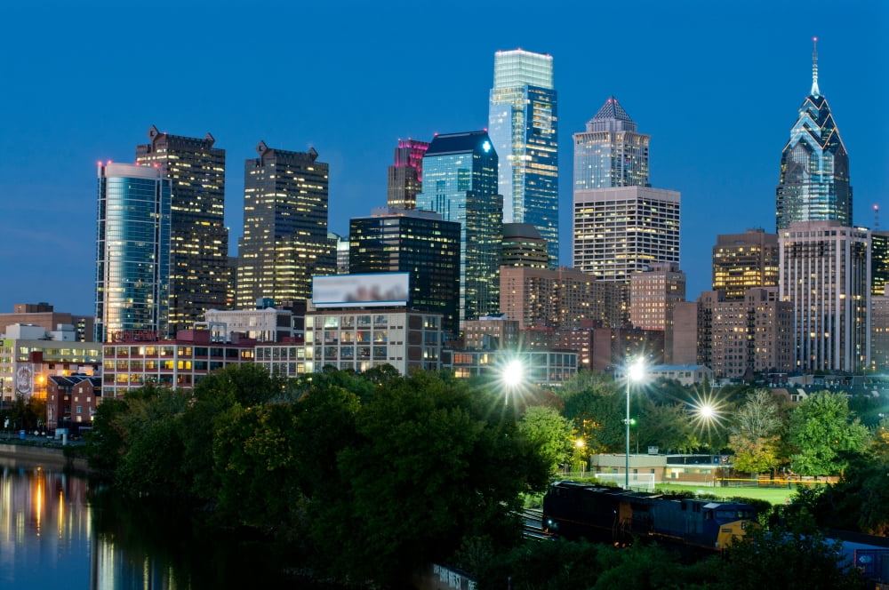 Skyscrapers in a city at dusk Philadelphia Pennsylvania USA Canvas Art - Panoramic Images (12 x 36)