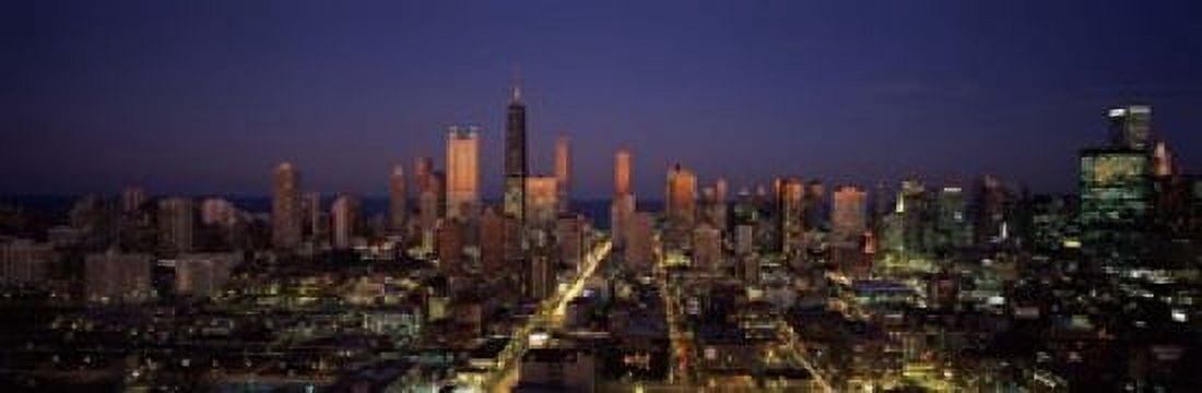 Skyscrapers in a city lit up at dusk Chicago Illinois USA Canvas Art - Panoramic Images (18 x 6)