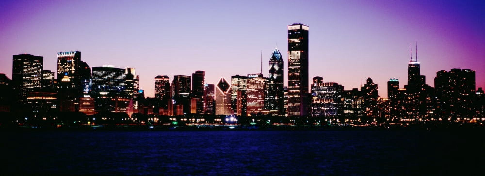 Skyscrapers in a city lit up at dusk Chicago Illinois USA Canvas Art - Panoramic Images (27 x 9)