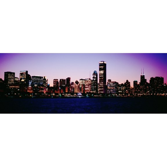 Skyscrapers in a city lit up at dusk Chicago Illinois USA Canvas Art - Panoramic Images (36 x 12)