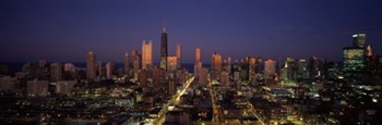Skyscrapers in a city lit up at dusk Chicago Illinois USA Canvas Art - Panoramic Images (36 x 12)