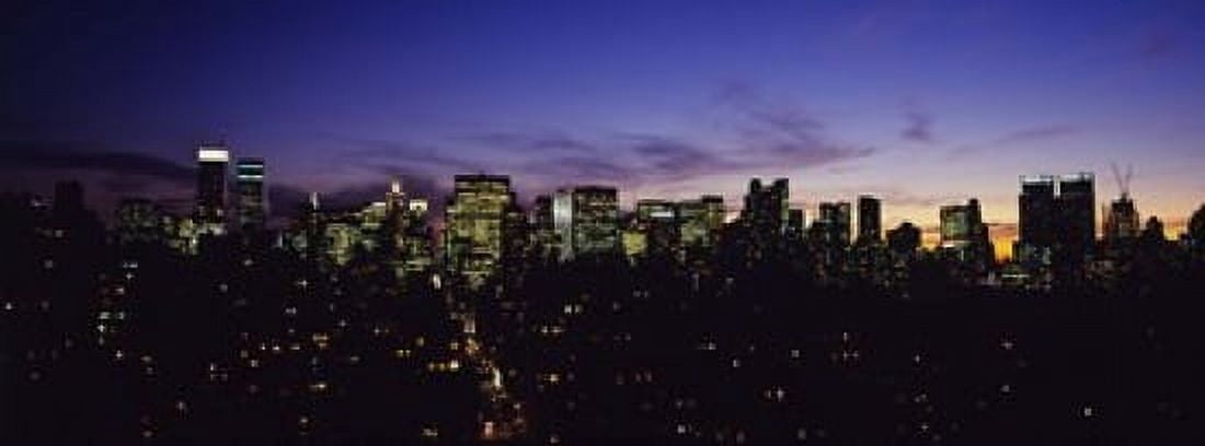 Skyscrapers in a city lit up at night Manhattan New York City New York State USA Canvas Art - Panoramic Images (15 x 6)