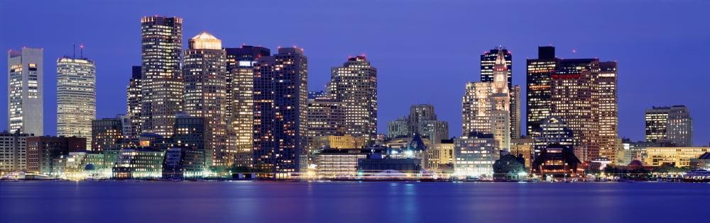Skyscrapers lit up at night Boston Massachusetts New England USA Canvas Art - Panoramic Images (27 x 9)