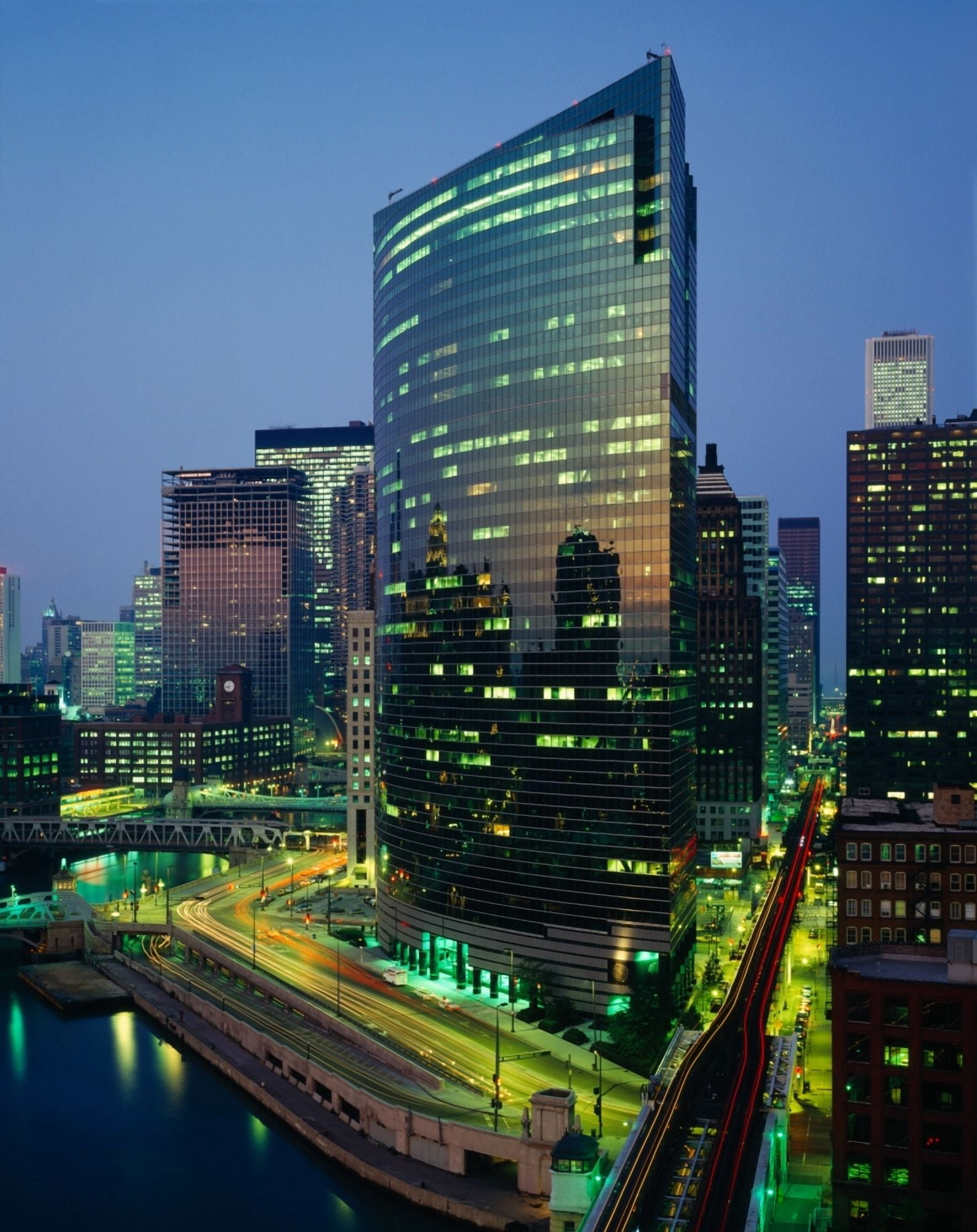 Skyscrapers lit up at night Chicago River Chicago Illinois USA Canvas Art - Panoramic Images (9 x 27)