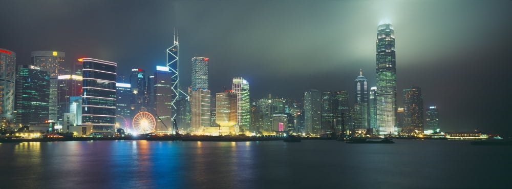 Skyscrapers lit up at night Two International Finance Center Hong Kong China Canvas Art - Panoramic Images (36 x 12)