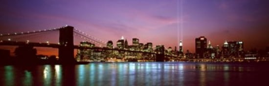 Skyscrapers lit up at night World Trade Center Lower Manhattan Manhattan New York City New York State USA Canvas Art - Panoramic Images (36 x 12)