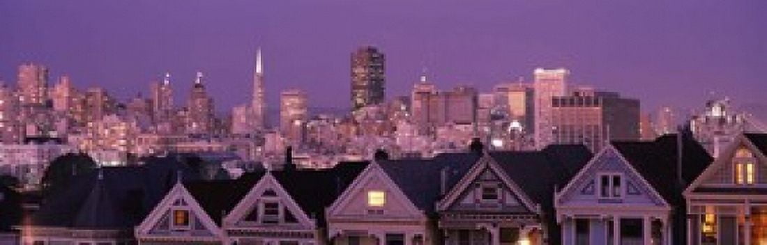 Skyscrapers lit up at night in a city San Francisco California USA Canvas Art - Panoramic Images (18 x 6)