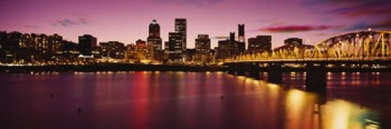 Skyscrapers lit up at sunset Willamette River Portland Oregon USA Canvas Art - Panoramic Images (36 x 12)