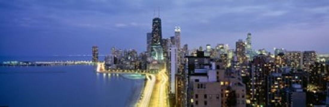 Skyscrapers lit up at the waterfront Lake Shore Drive Chicago Cook County Illinois USA Canvas Art - Panoramic Images (18 x 6)