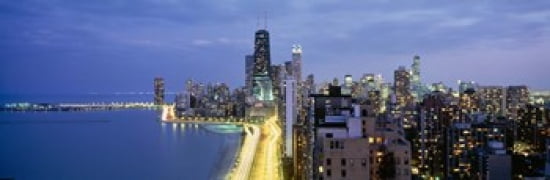 Skyscrapers lit up at the waterfront Lake Shore Drive Chicago Cook County Illinois USA Canvas Art - Panoramic Images (36 x 12)