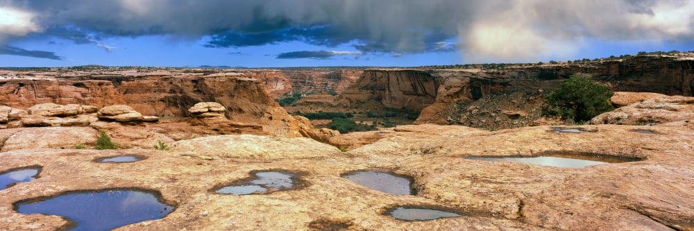 Slickrock waterpocket pools reflect sunrise colors Canyon De Chelly National Monument Arizona USA Canvas Art - Panoramic Images (27 x 9)