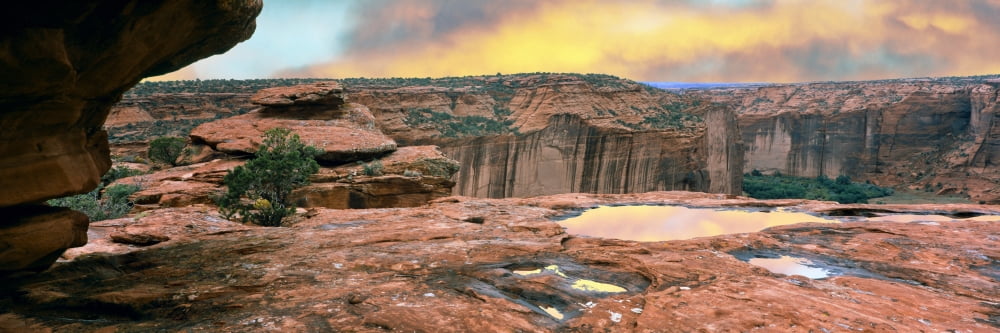 Slickrock waterpocket pools reflect sunrise colors Canyon De Chelly National Monument Arizona USA Canvas Art - Panoramic Images (27 x 9)