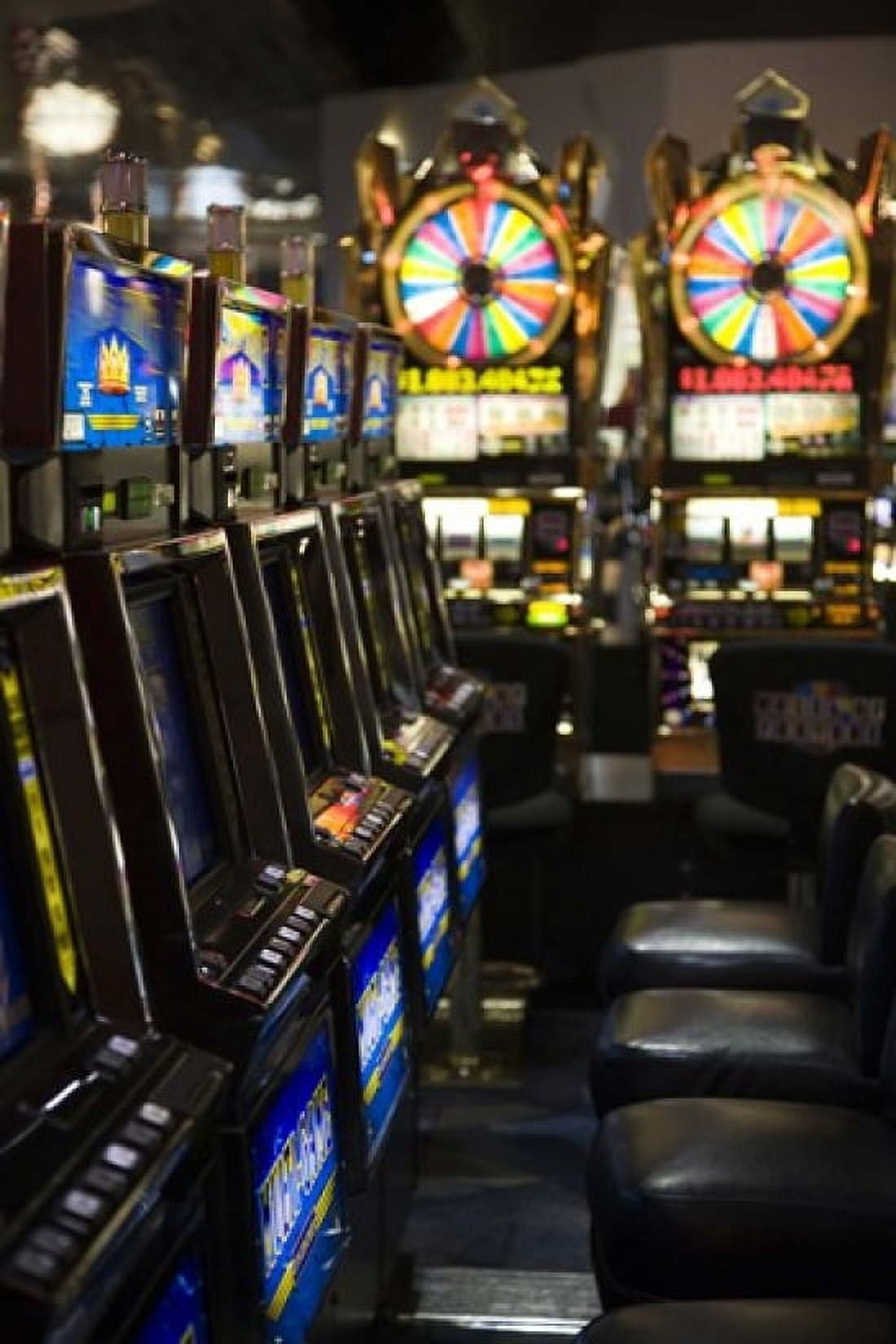 Slot machines at an airport McCarran International Airport Las Vegas Nevada USA Canvas Art - Panoramic Images (24 x 18)