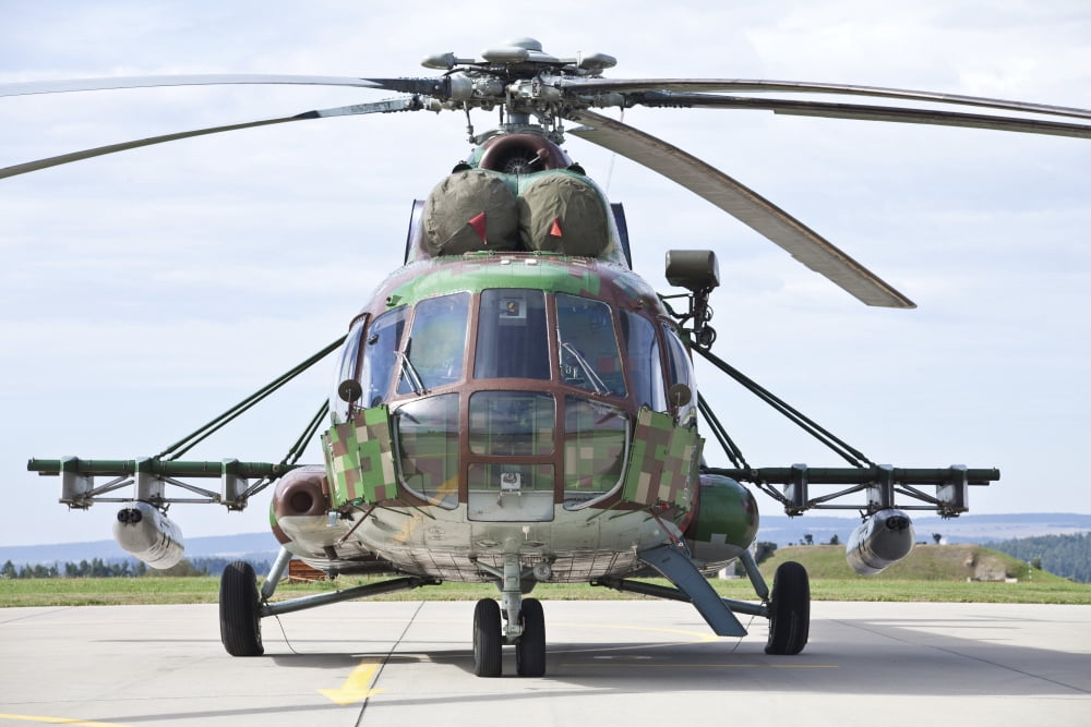 Slovakian Mi-17 with digital camouflage and gun pod Canvas Art - Timm ZiegenthalerStocktrek Images (18 x 12)
