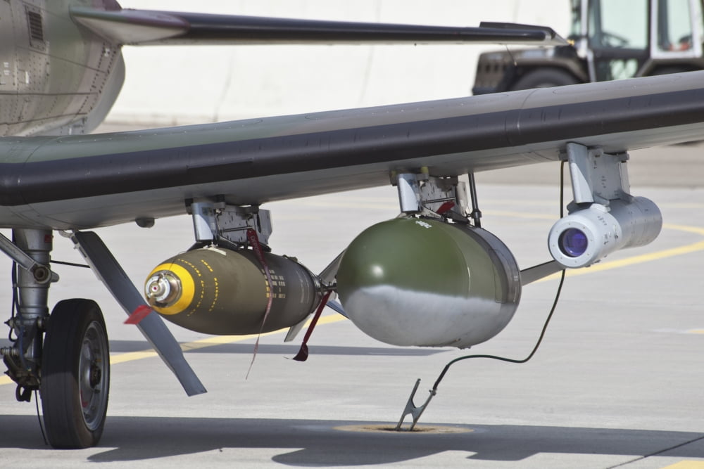Slovenian PC-9M with bombs equipped Canvas Art - Timm ZiegenthalerStocktrek Images (34 x 23)