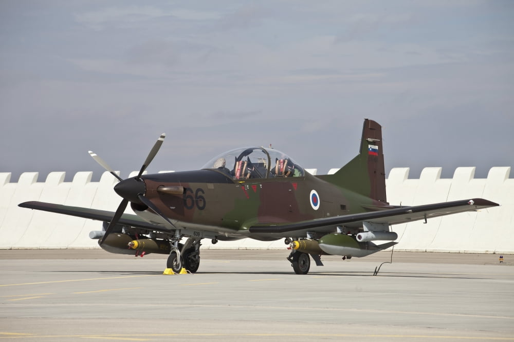 Slovenian PC-9M with bombs equipped Canvas Art - Timm ZiegenthalerStocktrek Images (35 x 23)