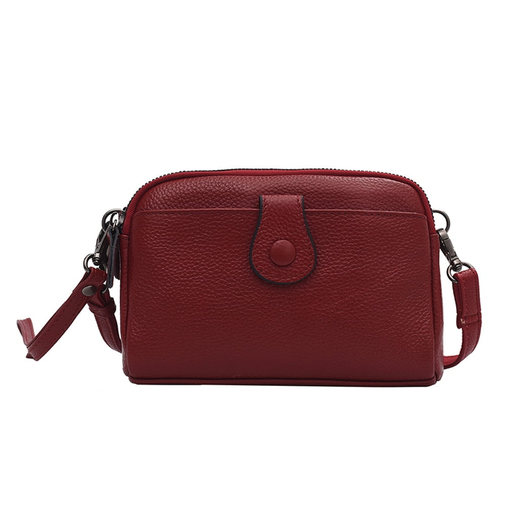 Coach New York Crossbody Purse with Red Leather Accents. We do not see a  serial number