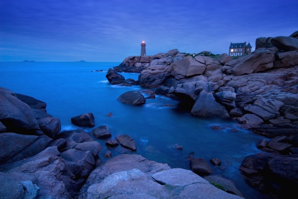 Small Lighthouse And House At Dusk Canvas Art - Ian Cumming  Design Pics (34 x 22)