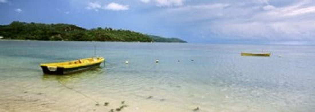 Small fishing boat in the ocean Baie Lazare Mahe Island Seychelles Canvas Art - Panoramic Images (18 x 7)