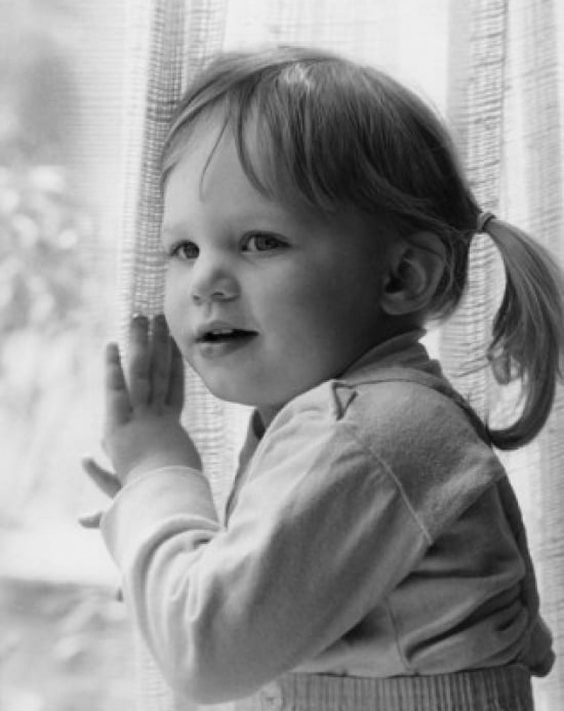 Small girl with pigtails by window Canvas Art - (24 x 36)