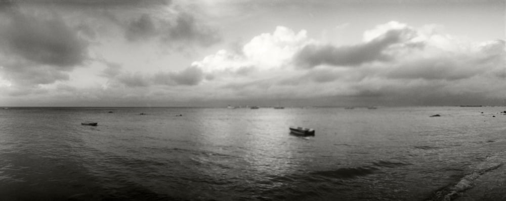 Small wooden boat in the ocean Morro De Sao Paulo Tinhare Cairu Bahia Brazil Canvas Art - Panoramic Images (27 x 9)