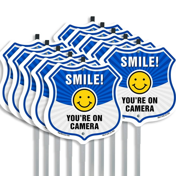 Smile You're On Camera Shield Sign Smile You're On Camera (10 Pack) 12 inch X 12 inch Shield Shaped Rust-Free Aluminum Metal Signs with Aluminum Mounting Stakes Weather Resistant for