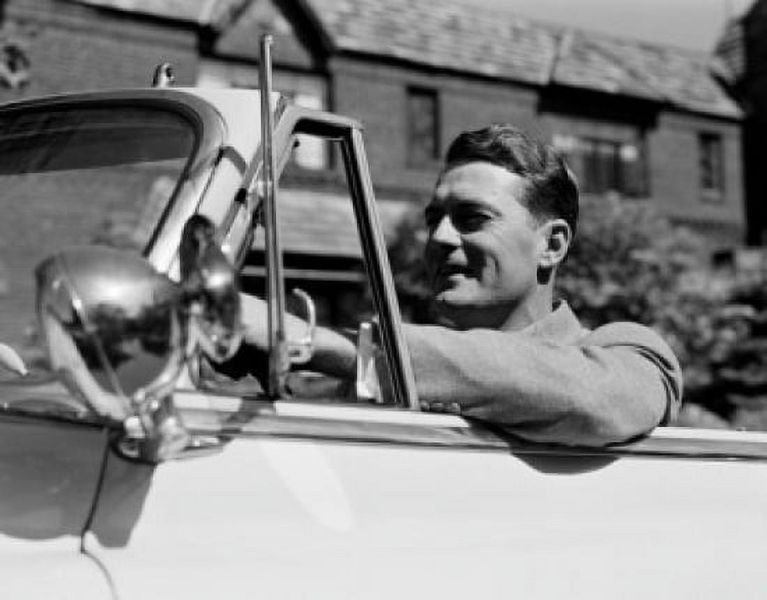 Smiling man in convertible car Canvas Art - (18 x 24)