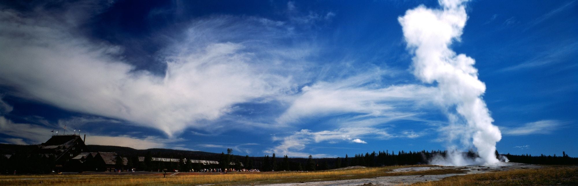 Smoke erupting from a geyser Old Faithful Upper Geyser Basin Yellowstone National Park Wyoming USA Canvas Art - Panoramic Images (12 x 36)