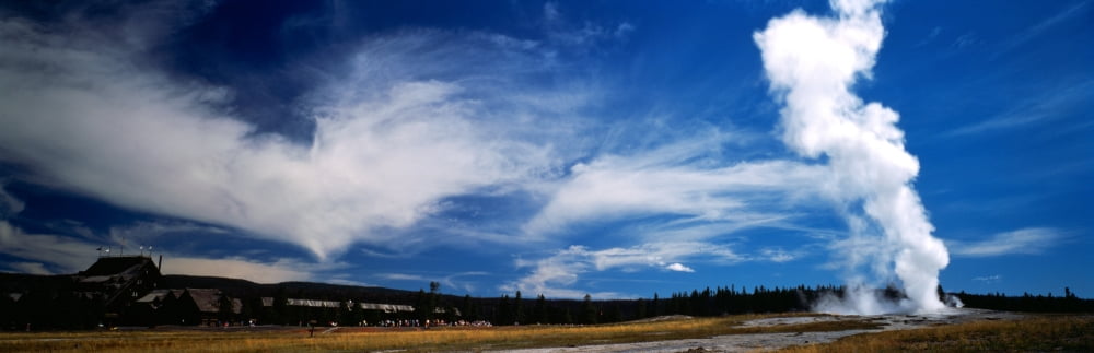 Smoke erupting from a geyser Old Faithful Upper Geyser Basin Yellowstone National Park Wyoming USA Canvas Art - Panoramic Images (6 x 18)