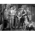 thumbnail image 1 of Smuggler's Cove Group of People Looking at the Dog in a Movie Scene Photo Print (8 x 10), 1 of 1