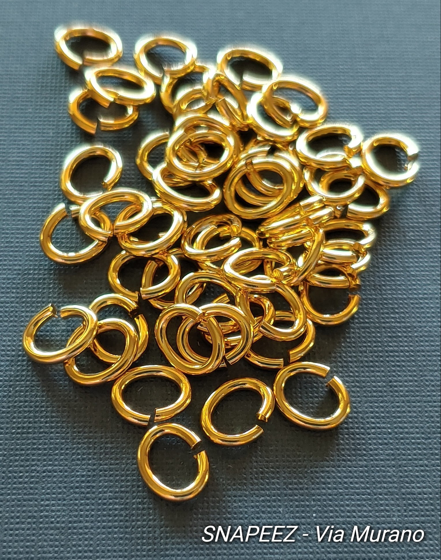 Snapeez II ULTRAPLATE 24 kt. Pure Gold Plate Oval Ring Hard Open Jump Ring 8x6mm Heavy Gauge (Pk 50) Jump Rings. The Ultra Secure No Solder Jump Ring. Made in USA.