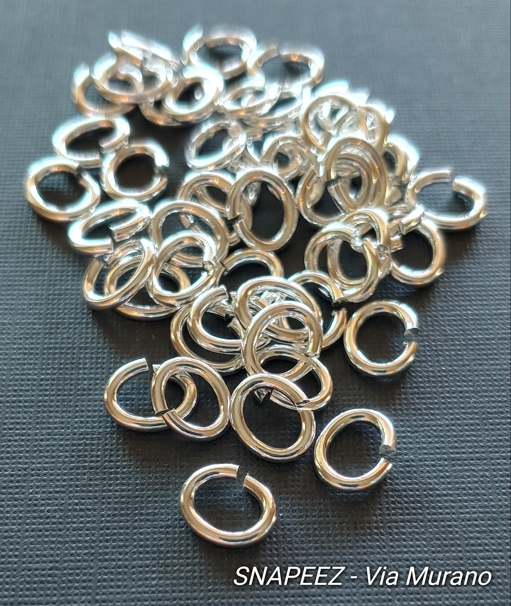 Snapeez II ULTRAPLATE 99.9% Pure Silver Plate Oval Ring Hard Open Jump Ring 8x6mm Heavy Gauge (Pk 50) Jump Rings. The Ultra Secure No Solder Jump Ring. Made in USA.