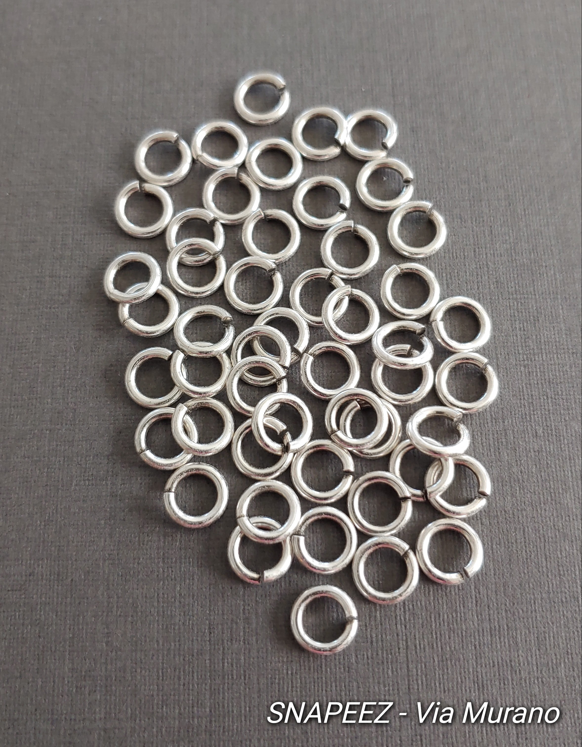 Snapeez II ULTRAPLATE 99.9% pure antique silver Moonlight Plate Ring Hard Open Jump Ring 7mm Heavy Gauge (Pk 50) Jump Rings. The Ultra Secure No Solder Jump Ring. Made in USA.