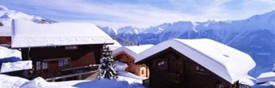 Snow Covered Chapel and Chalets Swiss Alps Switzerland Canvas Art - Panoramic Images (36 x 12)